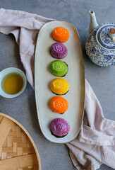 Common Malaysian Chinese street food snacks. Colorful Bite Size Ang Ku Kueh aka Tortoise Cake. Made from glutinous rice flour filled with mung bean paste, eaten during festive seasons and celebrations
