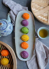 Common Malaysian Chinese street food snacks. Colorful Bite Size Ang Ku Kueh aka Tortoise Cake. Made from glutinous rice flour filled with mung bean paste, eaten during festive seasons and celebrations