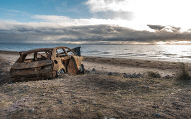 Ardeer beach, Ayrshire, with burned out car