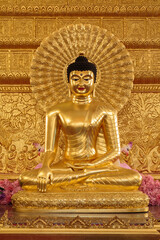 seated Buddha image in the temple made from mental,  Hair curl, Thailand