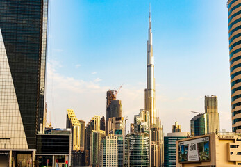 Dubai, UAE - 01.19.2021 - Burj Khalifa, tallest building in the world surrounded by other modern buildings. City