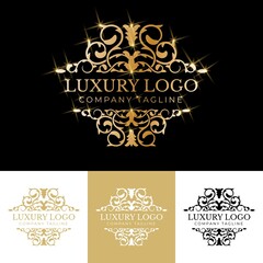 Golden calligraphic floral hand drawn monogram antique vintage style luxury logo design
