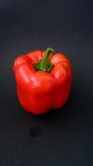 red pepper ON A BLACK BACKGROUND