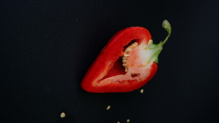 red pepper ON A BLACK BACKGROUND