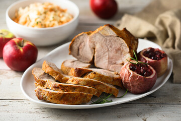 Homemade roasted pork with apples and cranberry