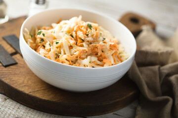 Traditional homemade coleslaw salad with fresh parsley	