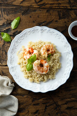 Roasted shrimps with quinoa and basil