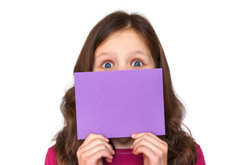 Naklejka premium Shock Attention Wow Concept. Shocked caucasian Girl with Big Eyes holding blank paper sheet over isolated background scared in shock with surprise face, afraid and excited with fear expression