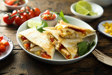Homemade quesadilla with chicken and tomatoes