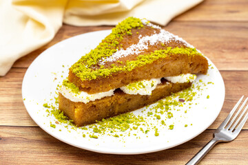 Turkish Traditional Dessert Ekmek Kadayif / Bread Pudding. Ramadan Dessert with cream