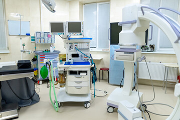 Modern surgery interior room. Close up view of hospital emergency equipment.
