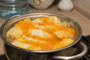 cooking meat stuffed cabbage