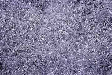 Silver foil background with shiny mint surface for texture background