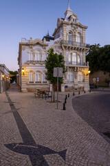 Fototapeta premium Famous historic Belmarco palace at night in Faro downtown, Algarve, south Portugal