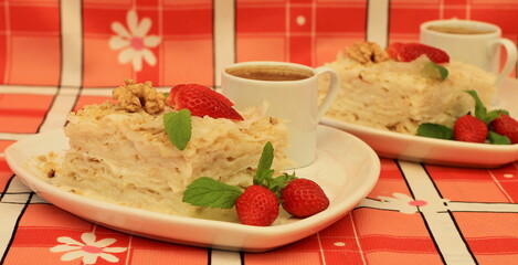Gullach is a national Turkish dessert made from milk and rice cakes, which has been prepared since the time of the Ottoman Empire. 
Sweet Turkish dessert made from rice dough with milk impregnation.