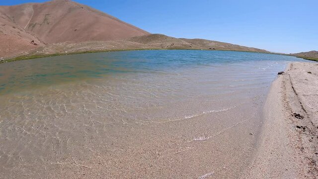 The shores of one of the 5 Arashan lakes in Central Asia at an altitude of 2774 to 3365 m above sea level, Namangan valley