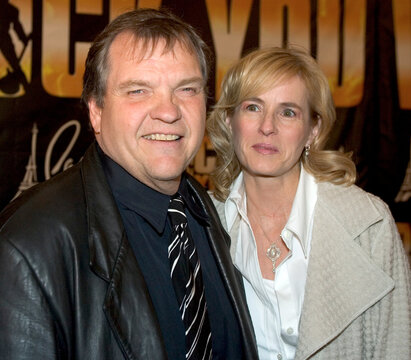 Meat Loaf and fiancee Deborah arrive at premiere of We Will Rock You musical.