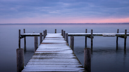 Naklejka premium Sunset at the Steinhuder Meer. Jetty leads into the water