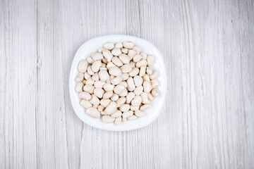 White Haricot bean grains in a white plate