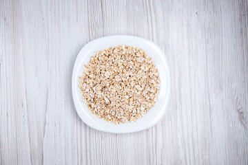 oatmeal in a white plate on the table