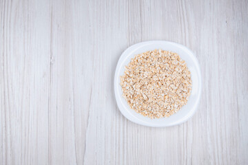 oatmeal in a white plate on the table. Healthy food. Food for breakfast. Breakfast