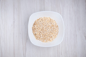 oatmeal in a white bowl on the table. Healthy food. Food for breakfast. Breakfast