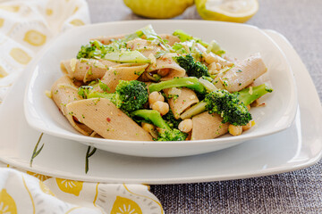 Pasta with broccoli, chickpeas and lemon zest. Vegan recipe