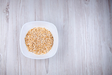 oatmeal in a white bowl on the table free space. Healthy food. Food for breakfast. Breakfast
