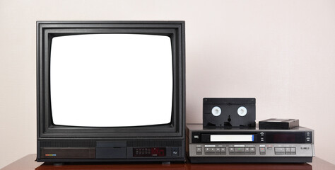  Old black vintage TV with white screen to add new images to the screen, VCR against wallpaper from 1980s, 1990s, 2000s. 