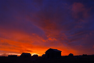 Sunset in the abandoned Tobseda village, Barents Sea coastal area, Russia