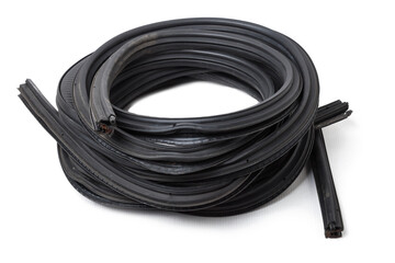 Rolled up black rubber sealant for elements of the car body, doors or trunk, for noise insulation, thermal and sound, preventing heat loss in the car interior. Sealing gasket for repair in a workshop