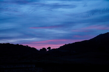 Sunrise behind the Toro mountain in Menorca.