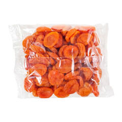 Dried apricot fruits in a transparent plastic bag isolated on a white background. Top view.