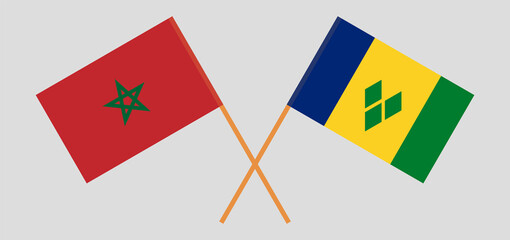 Crossed flags of Morocco and Saint Vincent and the Grenadines. Official colors. Correct proportion