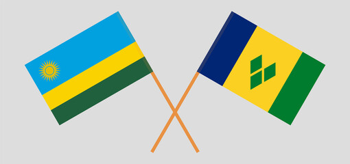 Crossed flags of Rwanda and Saint Vincent and the Grenadines. Official colors. Correct proportion