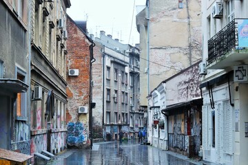  Street of the old town on a damp gray winter day 