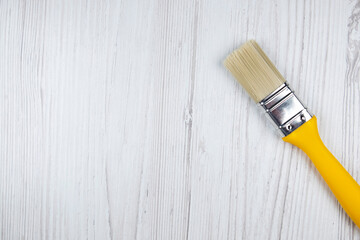 Top view of small paint brush, free space