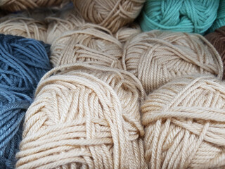 skeins of colored yarn, natural palette