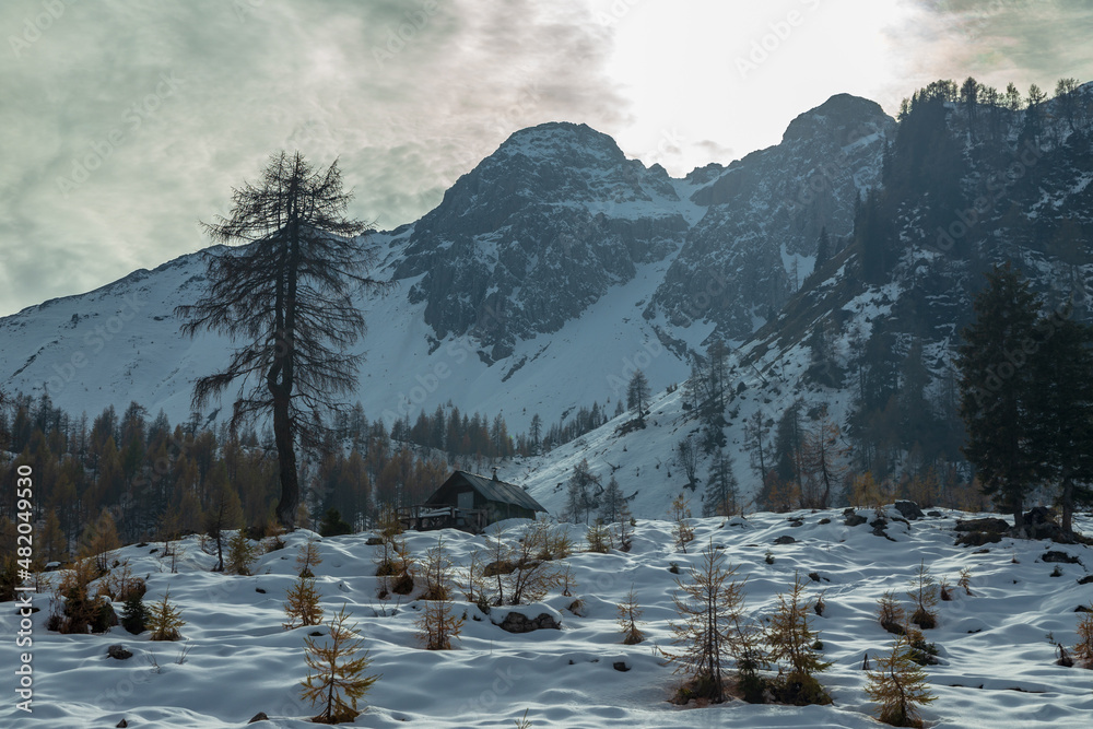 Wall mural Trekking day in a snowy autumn in the Dolomiti Friulane, Friuli-Venezia Giulia