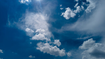 Naklejka na ściany i meble Abstract background of beautiful white clouds with blue sky in Brazil