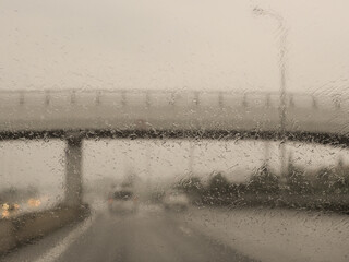 Stormy weather with heavy rain - the view from the car window. Israel