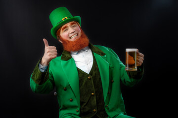 Leprechaun elf on St. Patrick's Day. Cheerful character Irish leprechaun for advertising with a red...