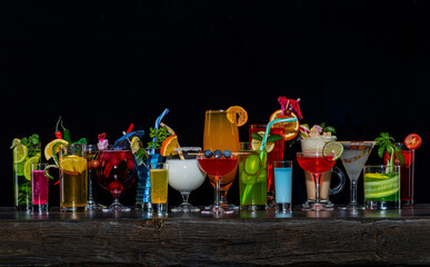 Set of coctails on bar counter in a restaurant, pub. Collection of fresh juice alcoholic drinks....