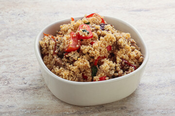 Arabic cous cous with meat and tomato