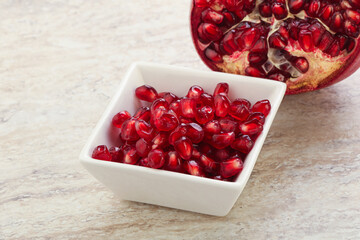 Ripe red Pomegranate seeds in the bowl