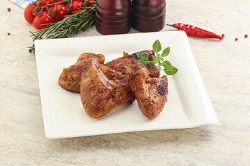 Roasted chicken wings with spicy sauce