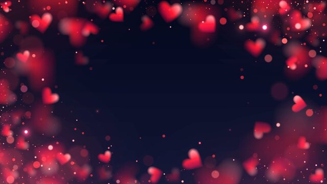 Frame of red hearts and sparks with blur effect on black background