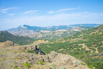 Fototapeta na wymiar View from the volcano Kara Dag to the mountains in Crimea