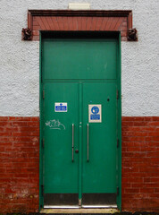 green door in a wall