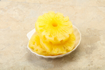 Sweet pineapple rings in the bowl